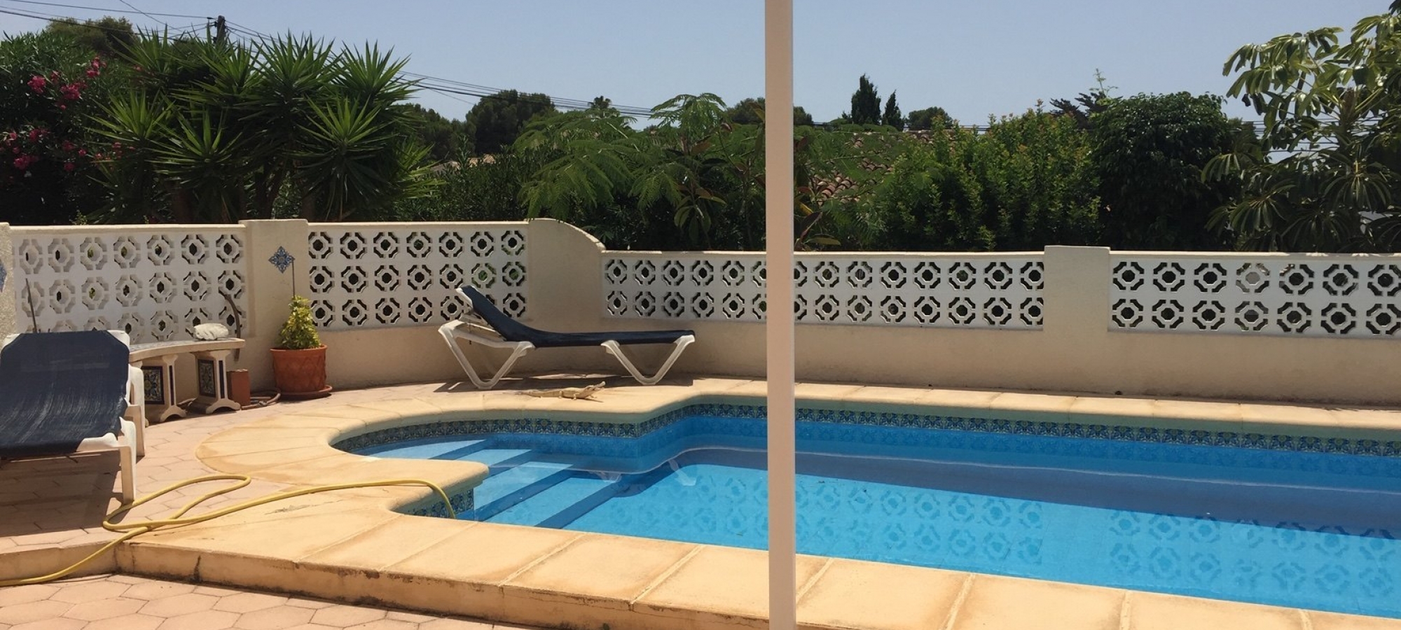 Villa recently reduced, within walking distance to town and beaches.