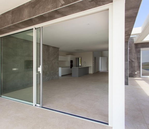 MORAIRA > EL TESORO - A modern style new build villa for sale with panoramic sea views in a new u...