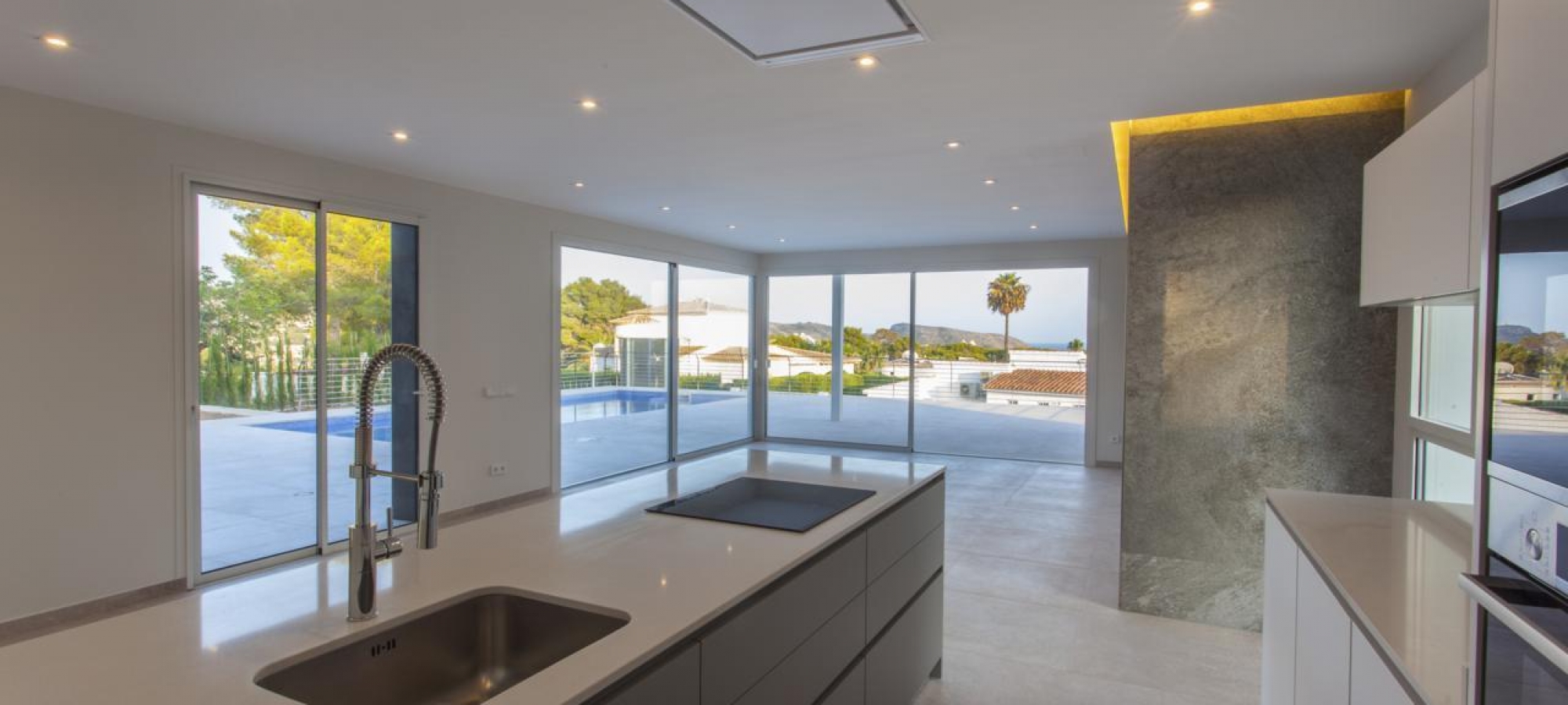 MORAIRA > EL TESORO - A modern style new build villa for sale with panoramic sea views in a new urbanisation.