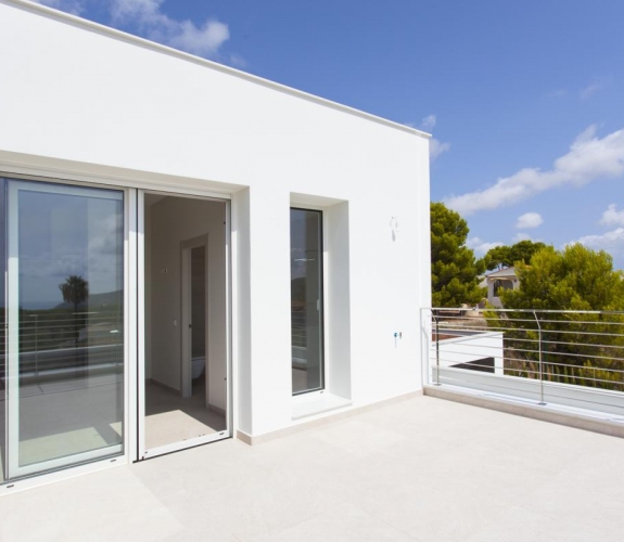 MORAIRA > EL TESORO - A modern style new build villa for sale with panoramic sea views in a new u...