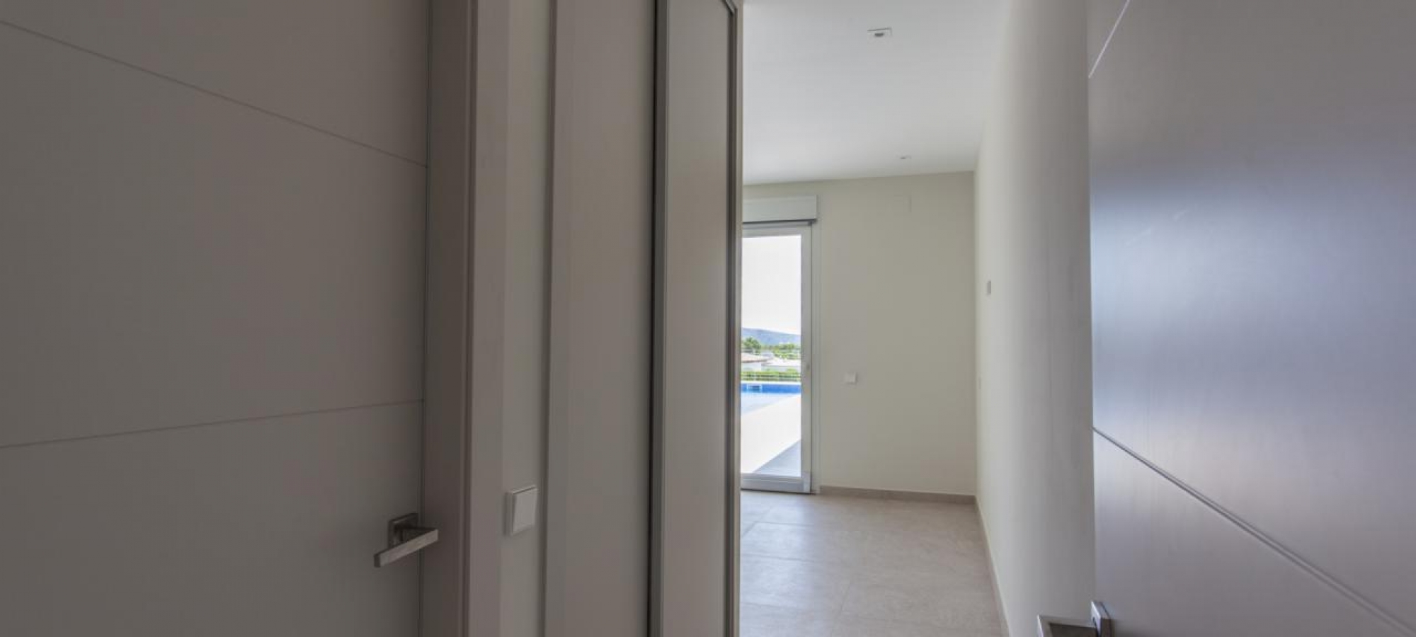 MORAIRA > EL TESORO - A modern style new build villa for sale with panoramic sea views in a new urbanisation.