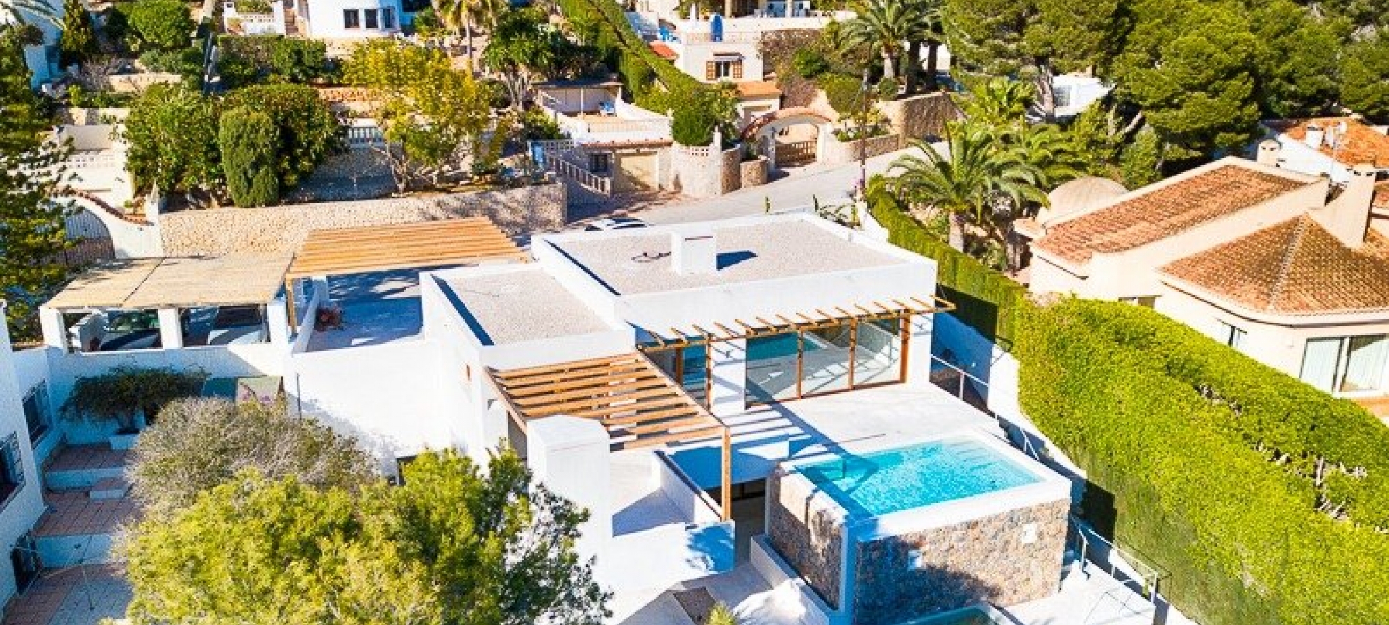 Moderne villa i Ibiza -stil til salg i Pinar del Advocat Moraira med havudsigt