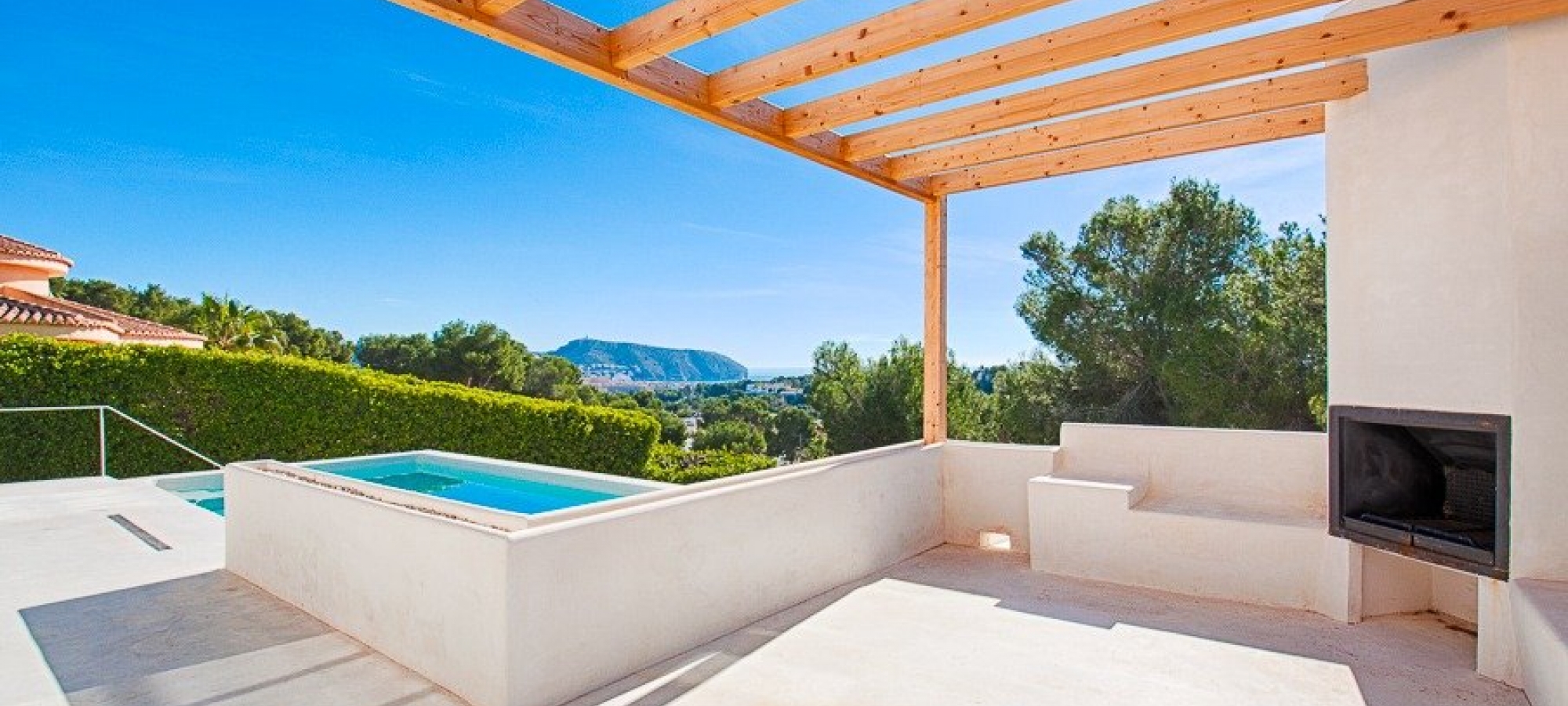 Moderne villa i Ibiza -stil til salg i Pinar del Advocat Moraira med havudsigt