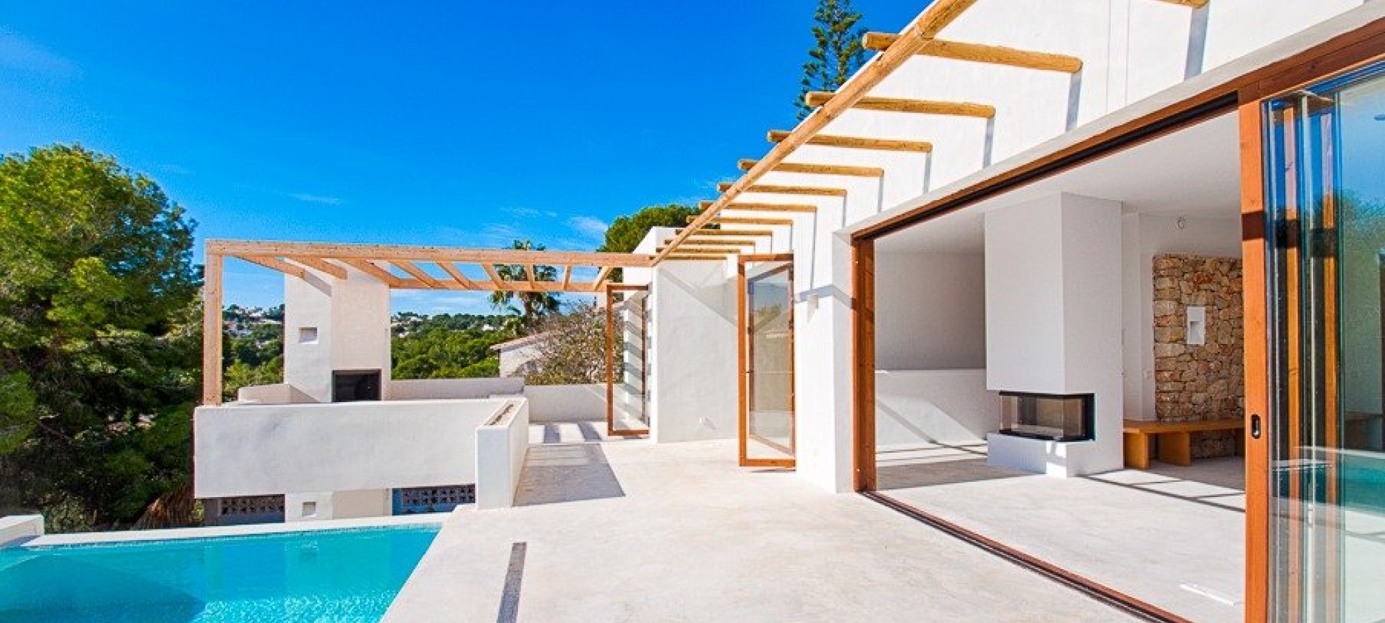 Moderne villa i Ibiza -stil til salg i Pinar del Advocat Moraira med havudsigt