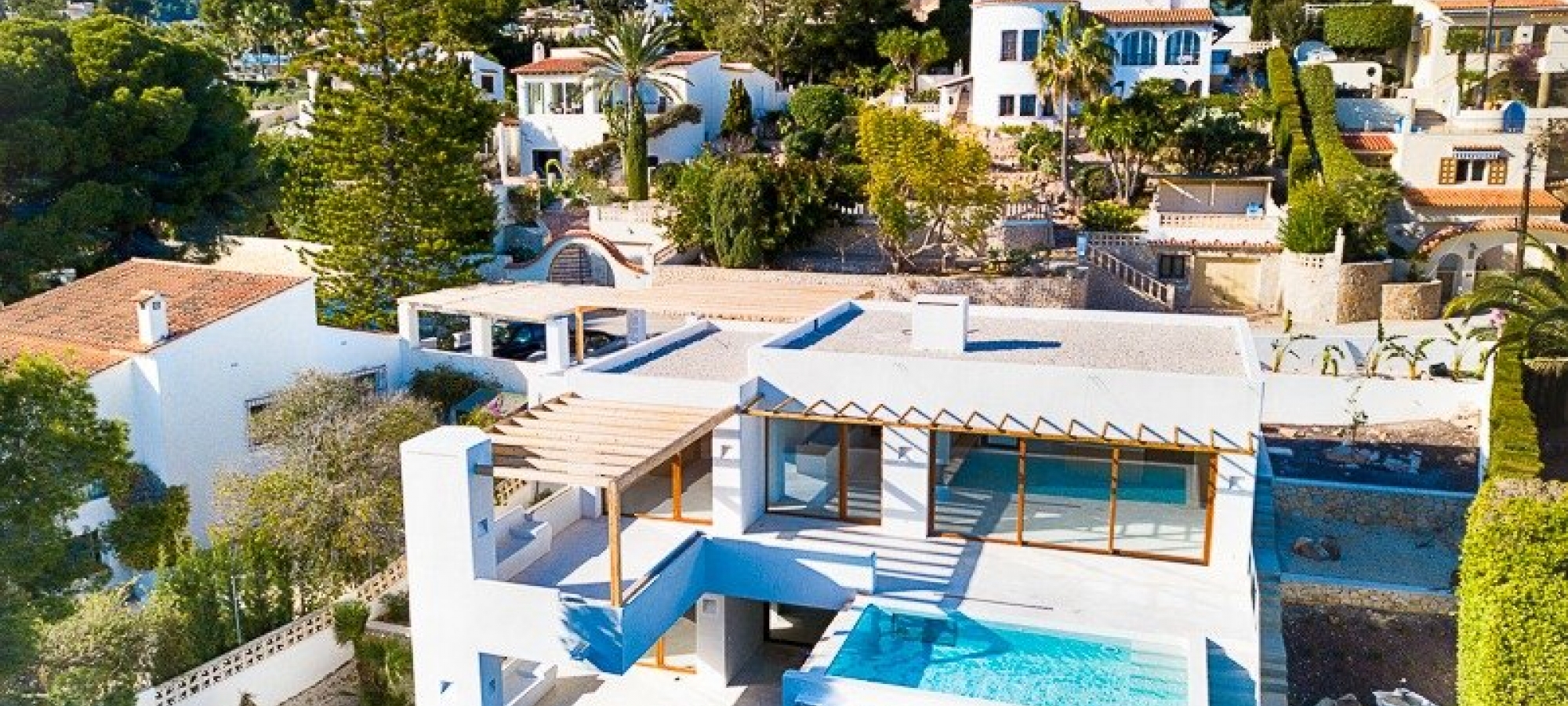 Moderne villa i Ibiza -stil til salg i Pinar del Advocat Moraira med havudsigt