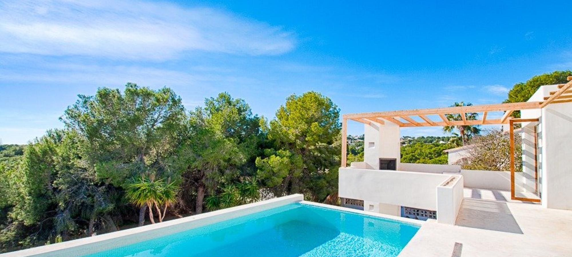 Moderne villa i Ibiza -stil til salg i Pinar del Advocat Moraira med havudsigt