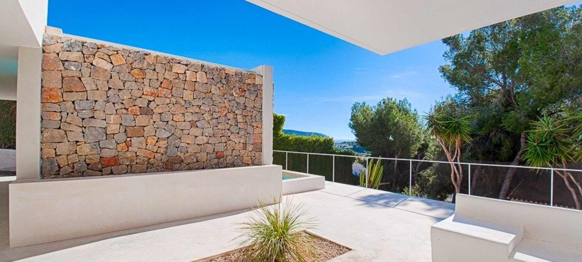 Moderne villa i Ibiza -stil til salg i Pinar del Advocat Moraira med havudsigt