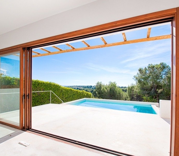 Modern Ibiza style New Build Villa for sale in Pinar del Advocat Moraira with Sea Views and walking ...