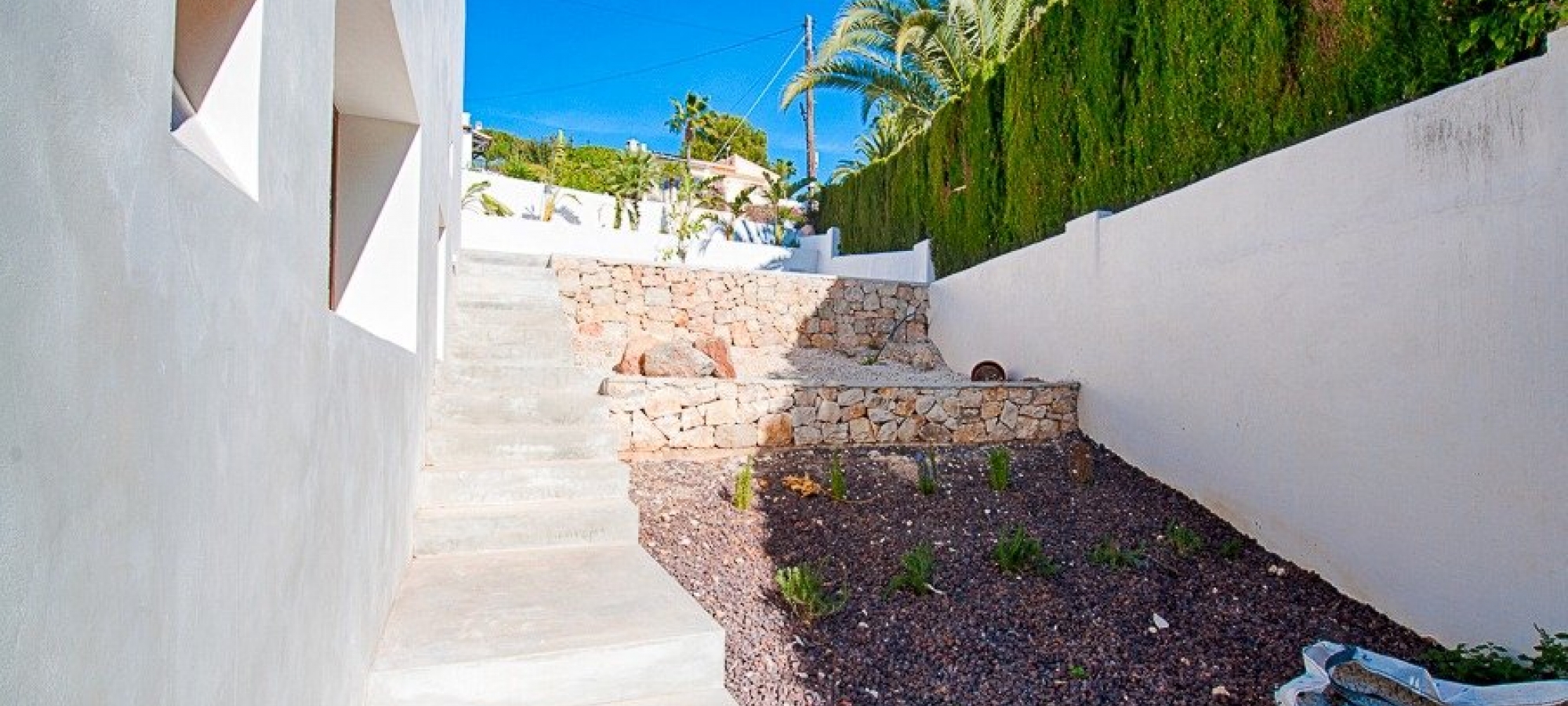 Moderne villa i Ibiza -stil til salg i Pinar del Advocat Moraira med havudsigt